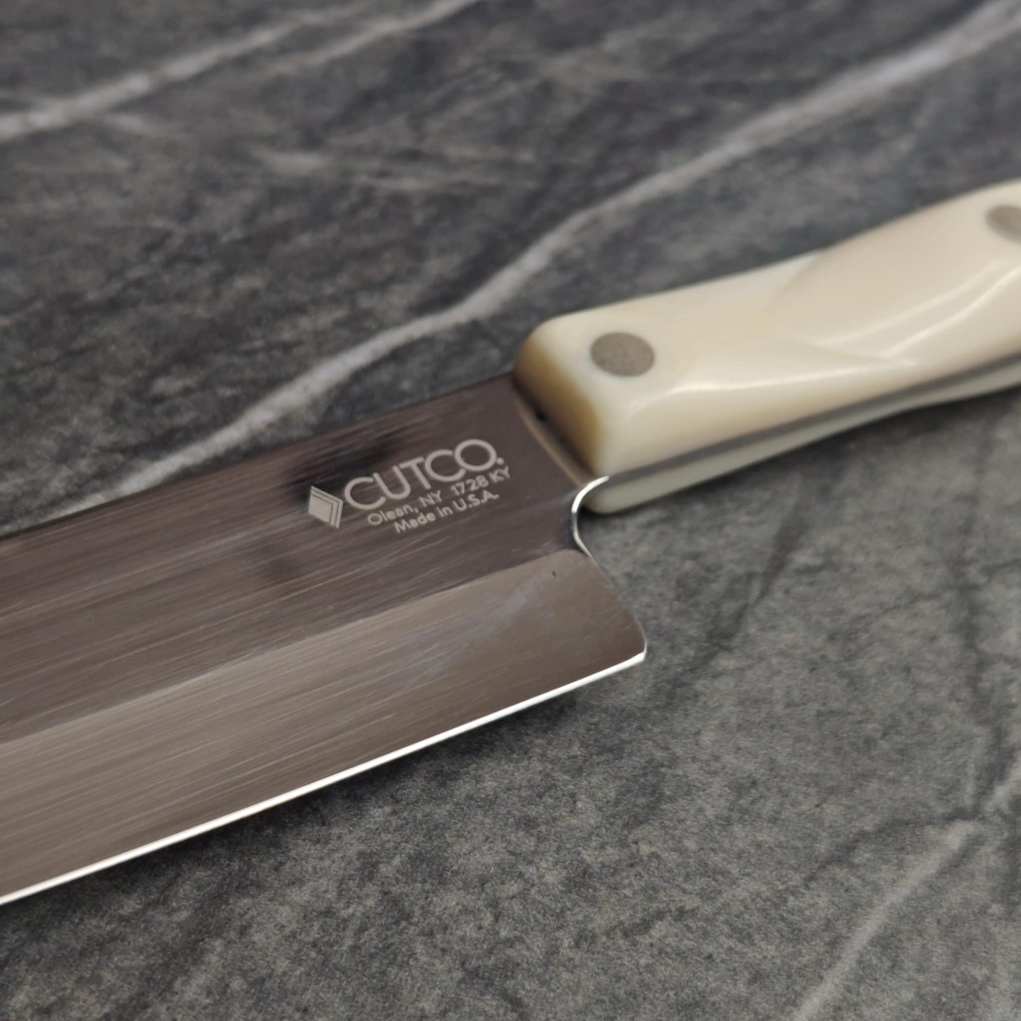 Cutco knife showing razor-sharp edge and brand detail