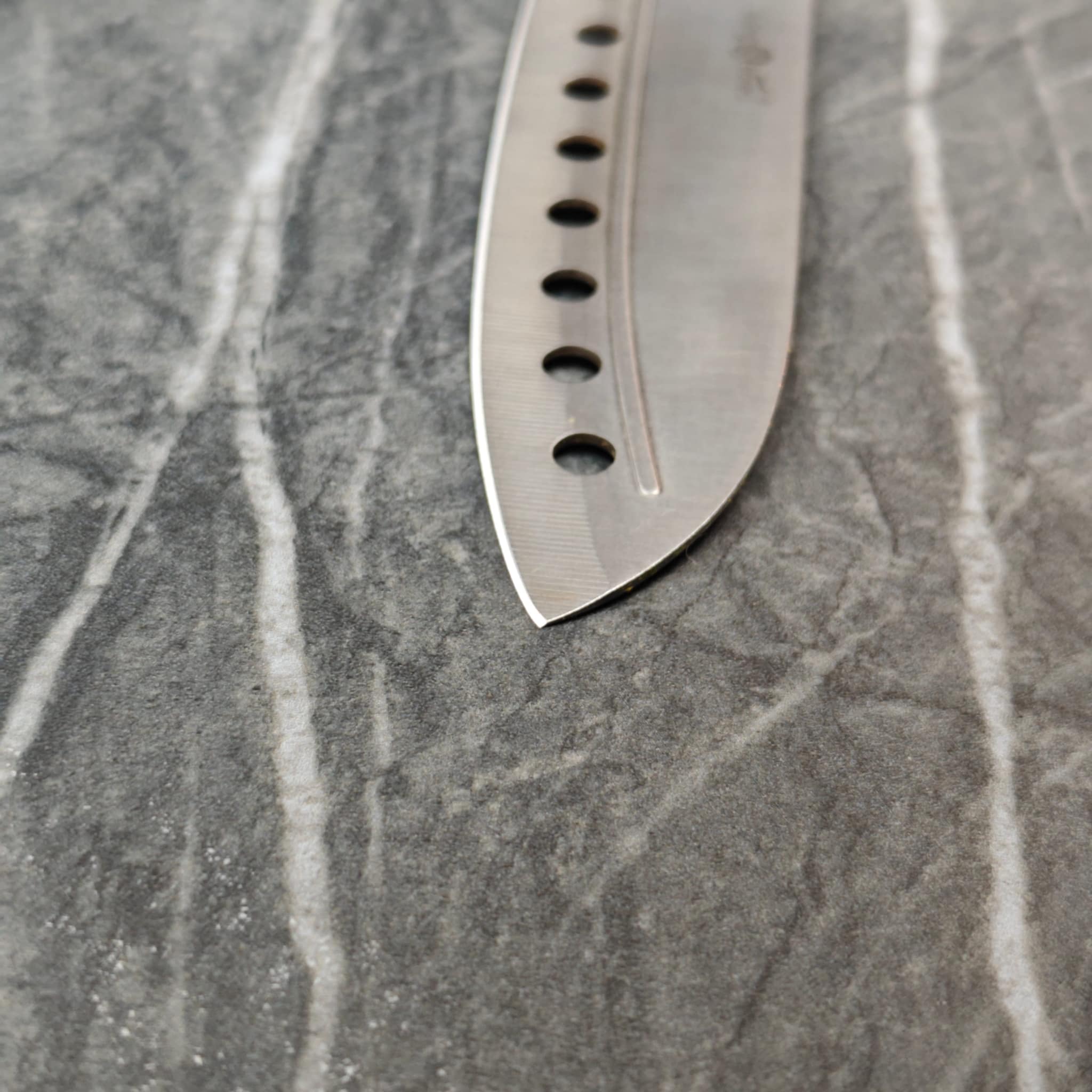 Extreme close-up of perfectly sharpened knife edge