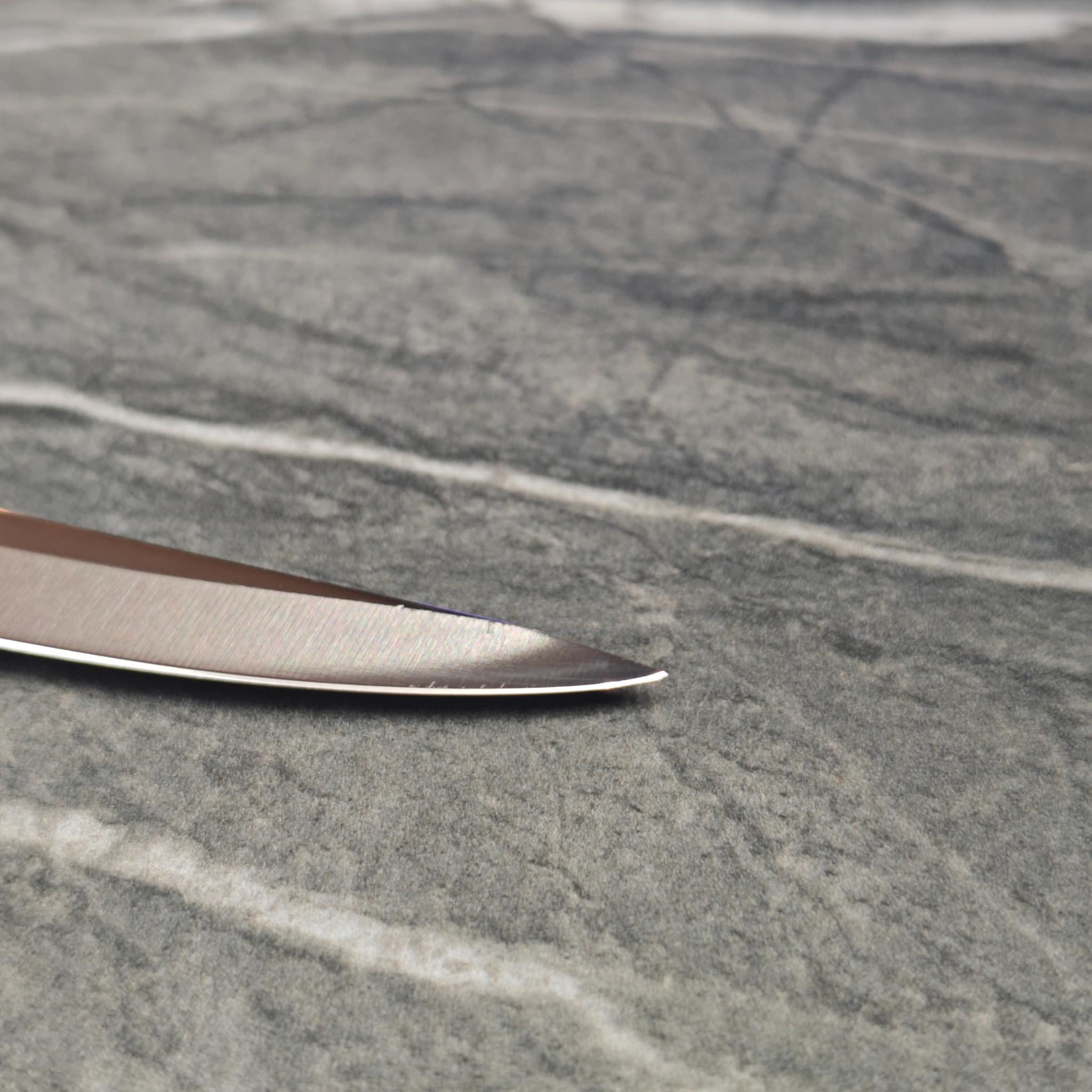 Knives lined up after evening sharpening session