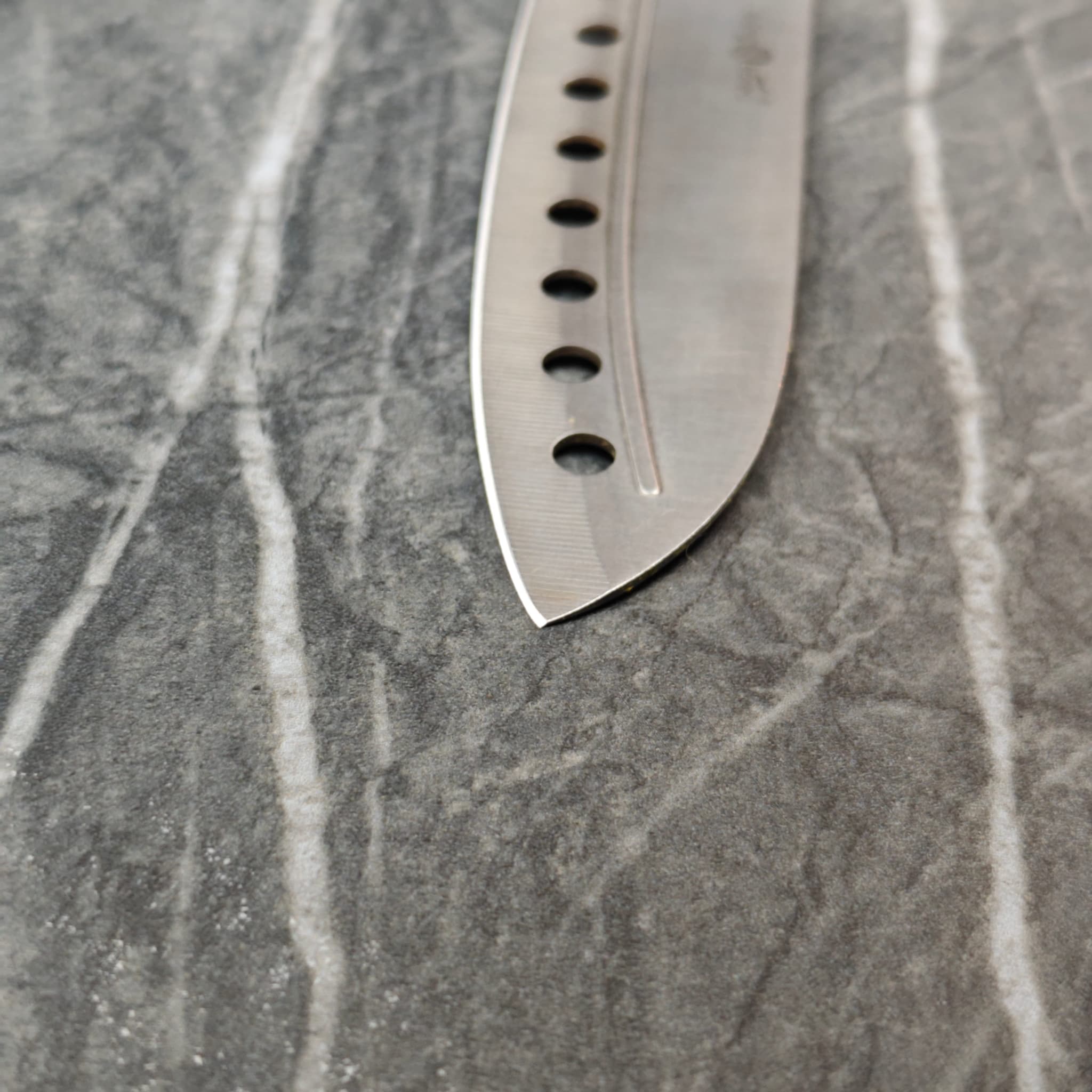 Close-up knife blade edge detail after sharpening