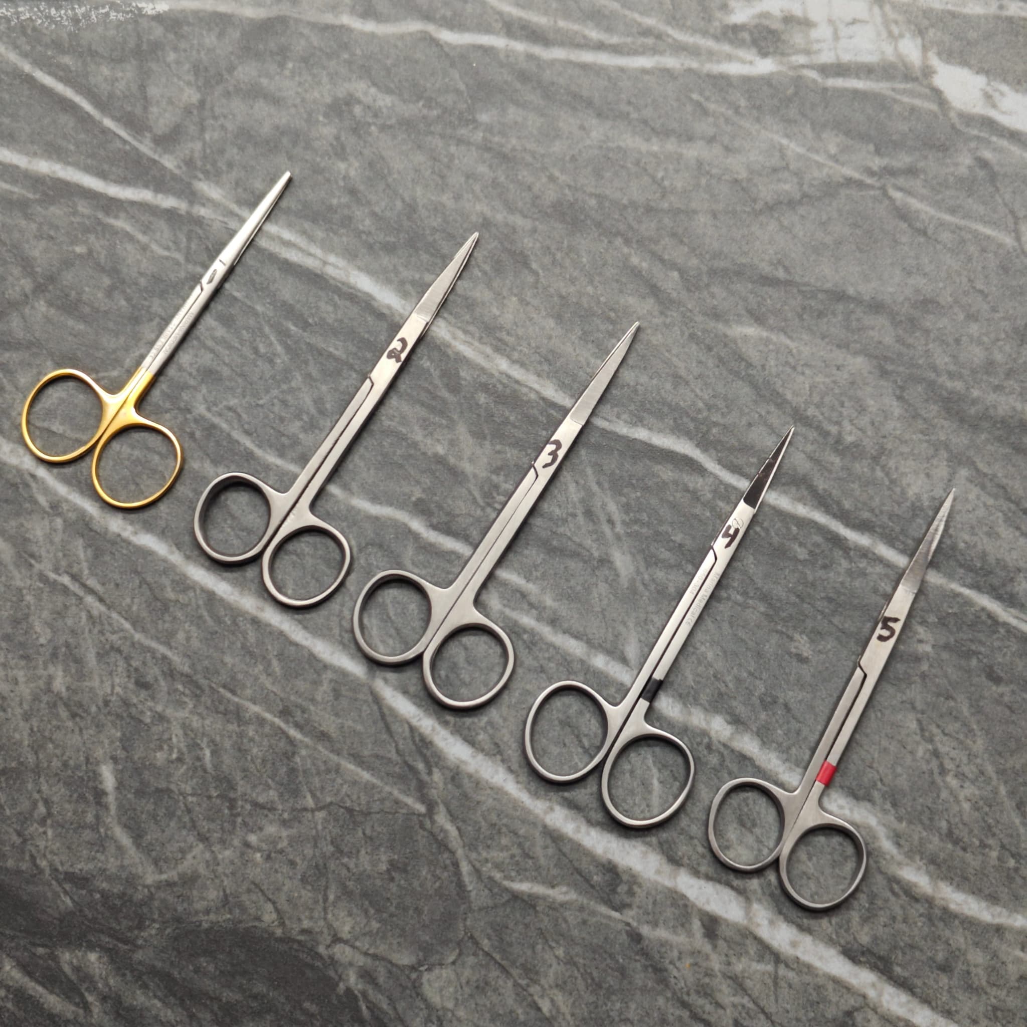 Scissors laid out before sharpening