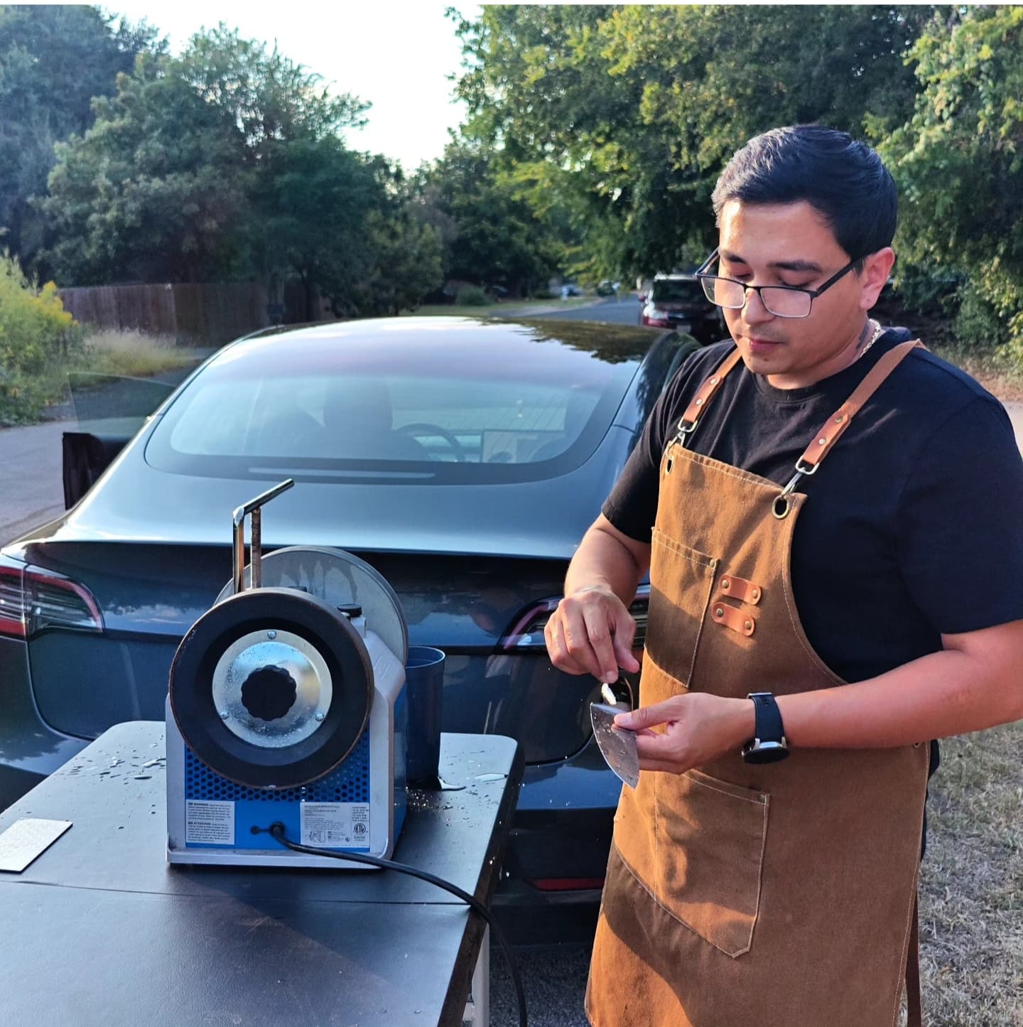 Michael demonstrating sharpening equipment