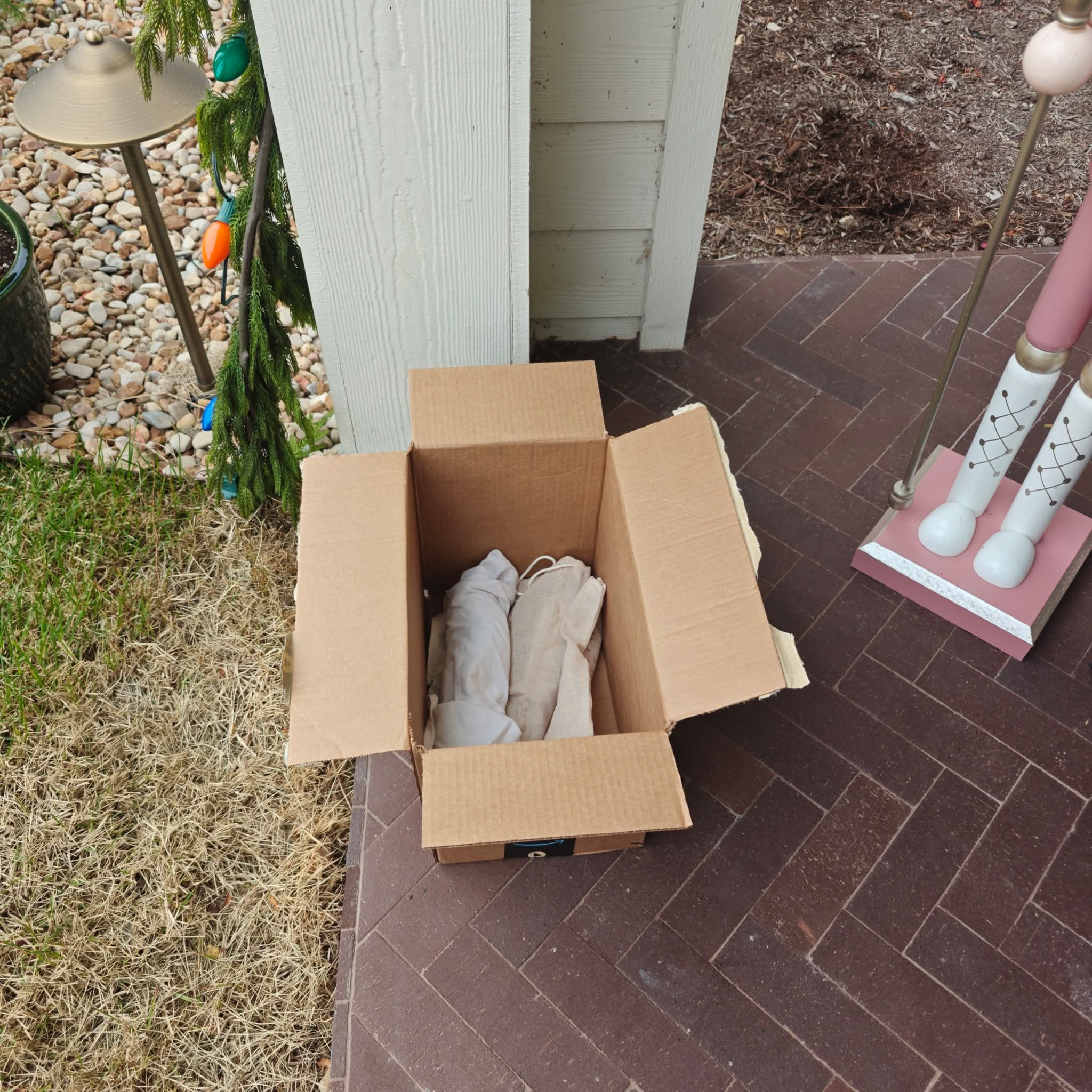 Porch pickup – wrapped knives at front door