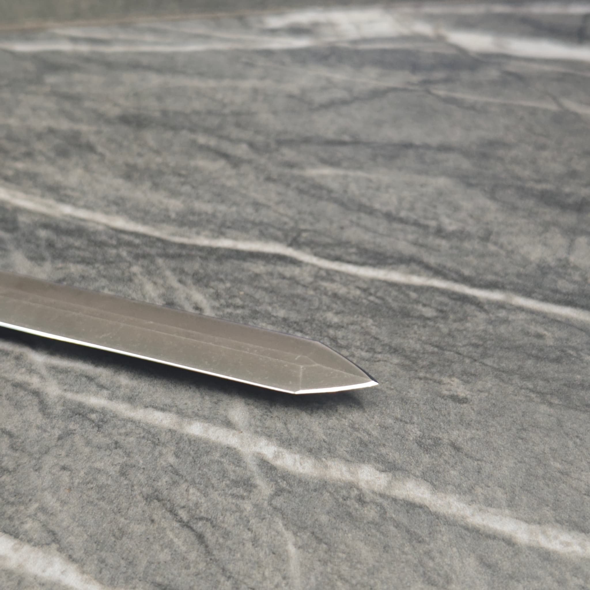 Knife blade polished and sharpened to factory edge