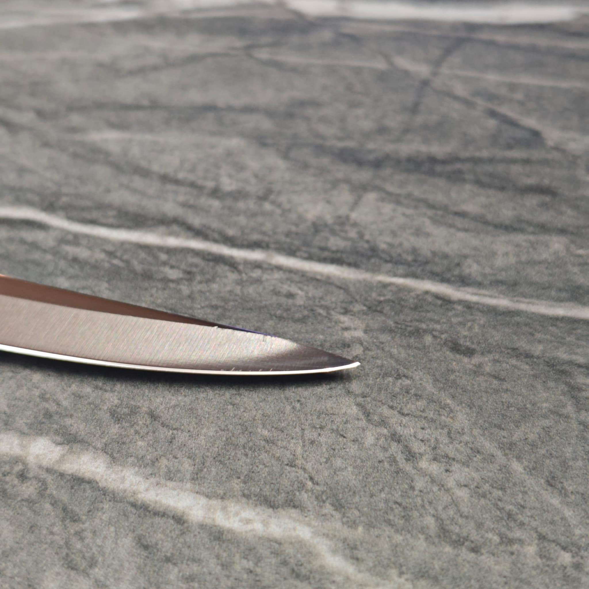Knives lined up after evening sharpening session