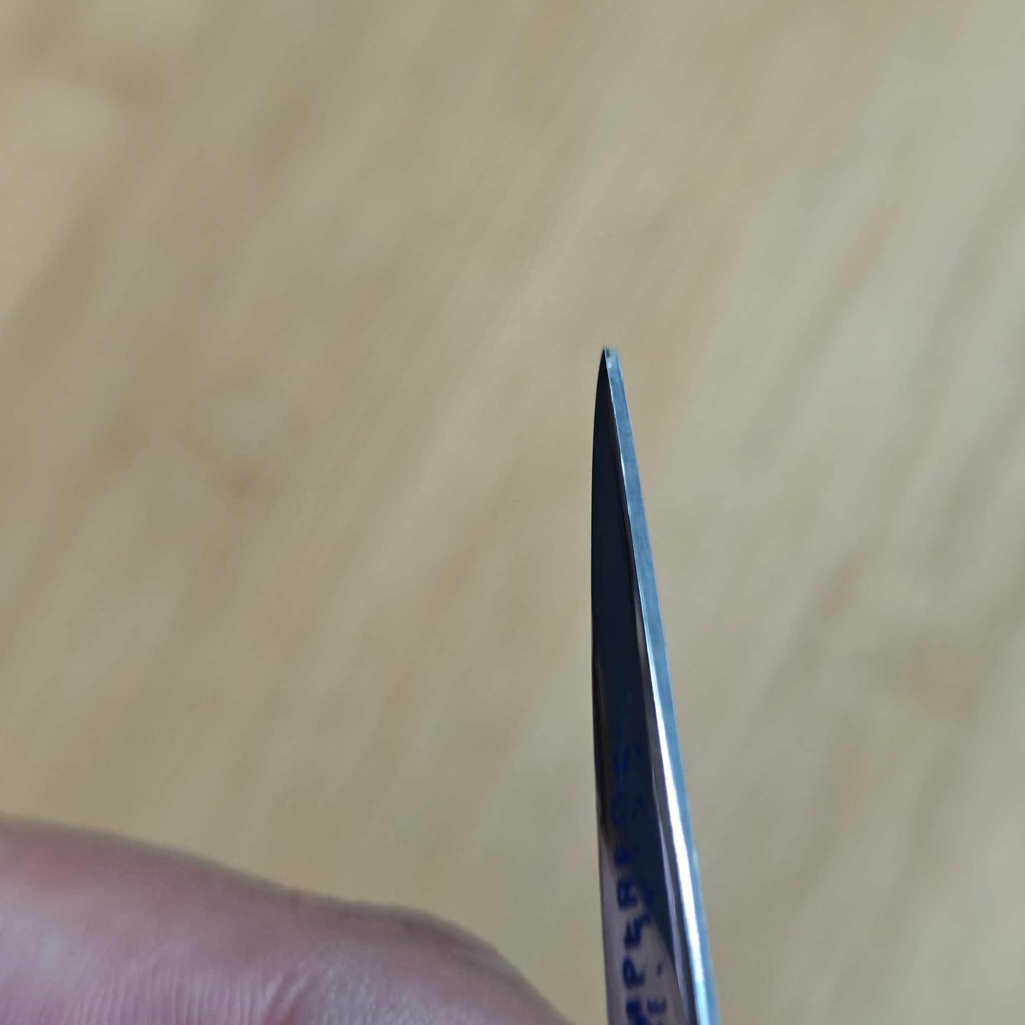 Scissor blade aligned and sharp after Mar 11 service