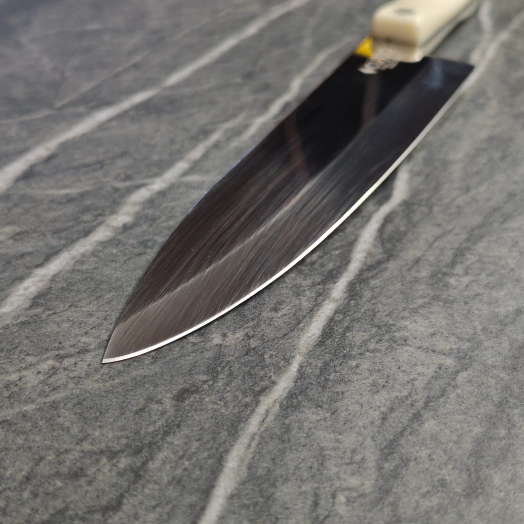 Beautiful Damascus steel pattern revealed through professional sharpening