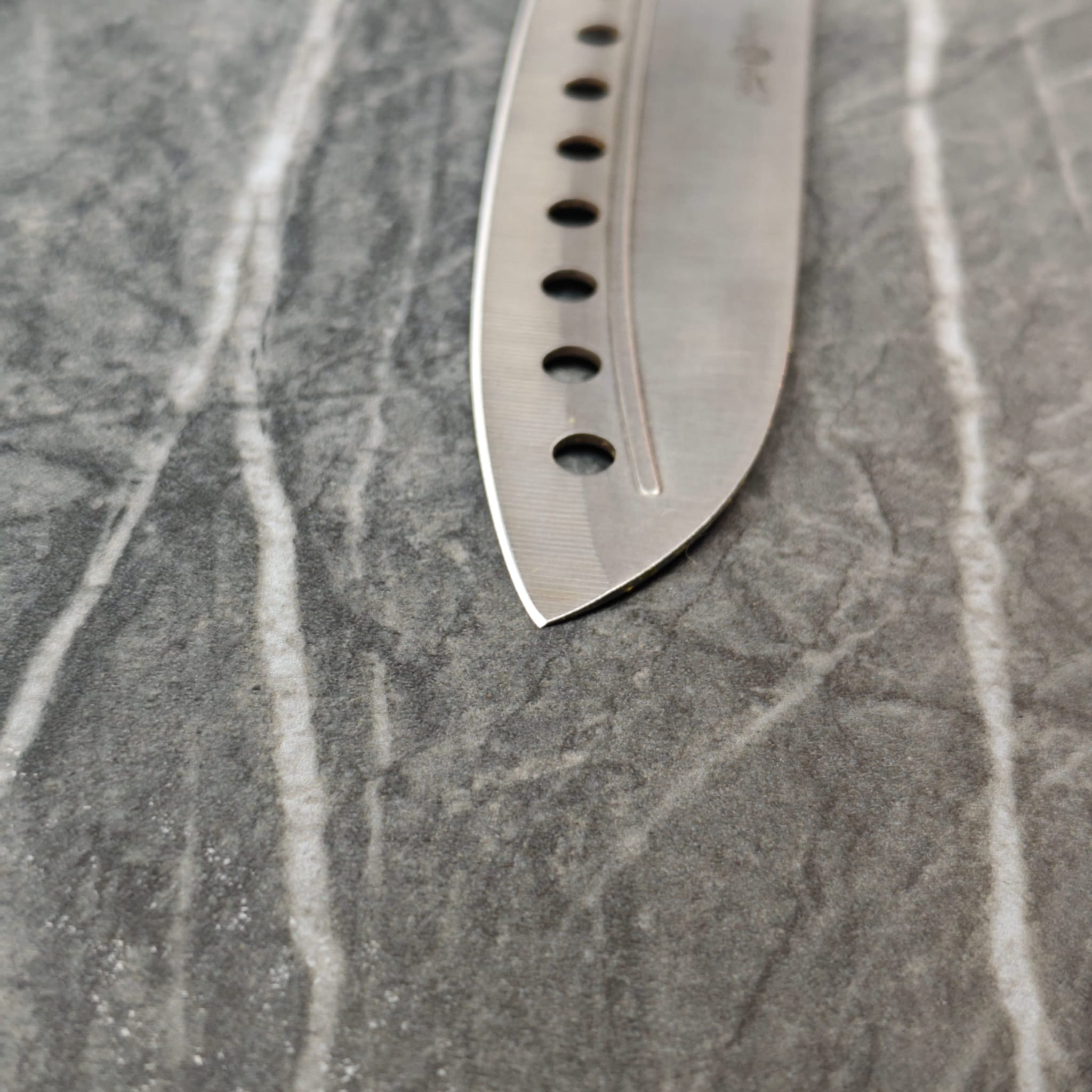 Extreme close-up of perfectly sharpened knife edge