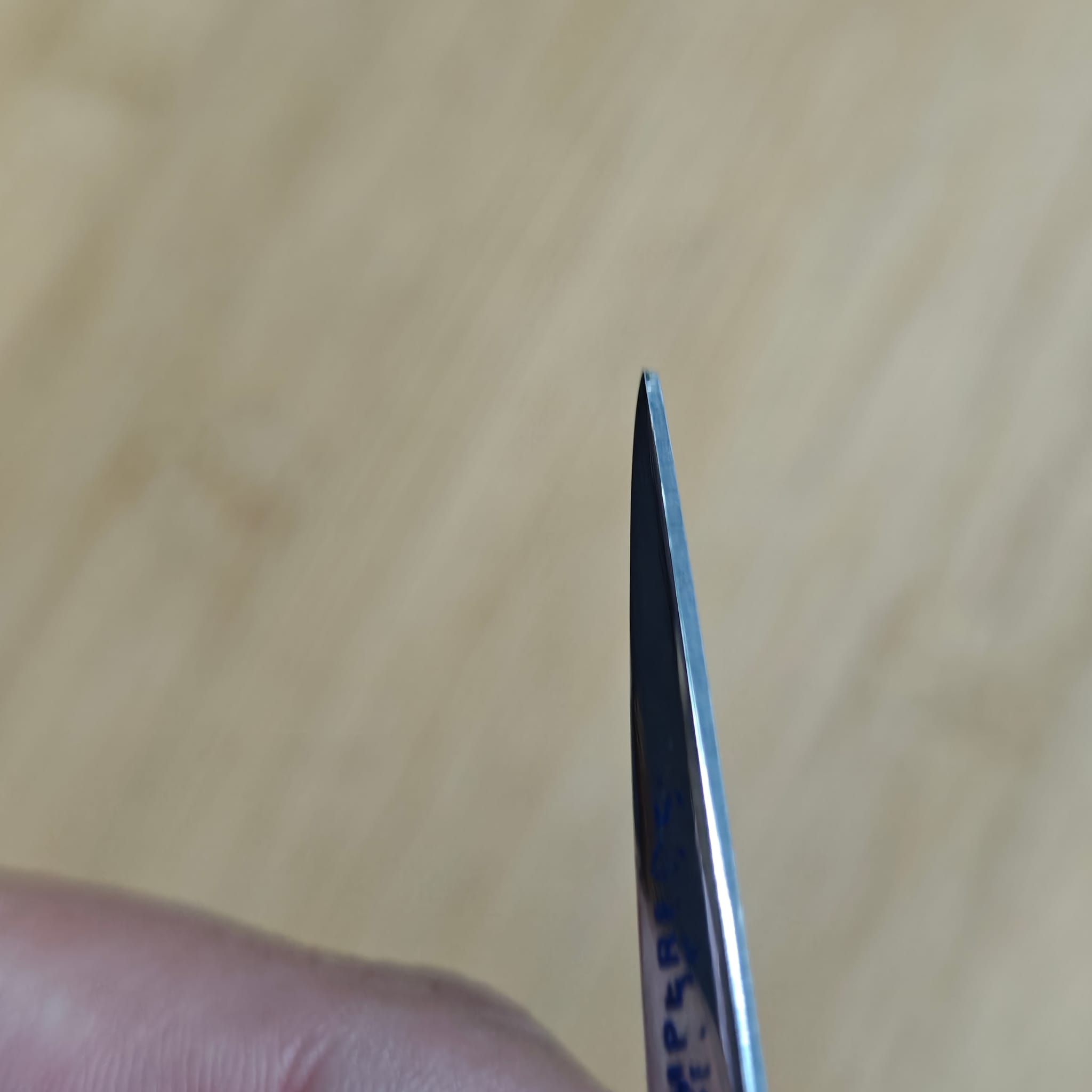 Scissor blade aligned and sharp after Mar 11 service