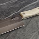 Cutco knife showing sharp edge and brand detail