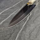Beautiful Damascus steel pattern on sharpened blade