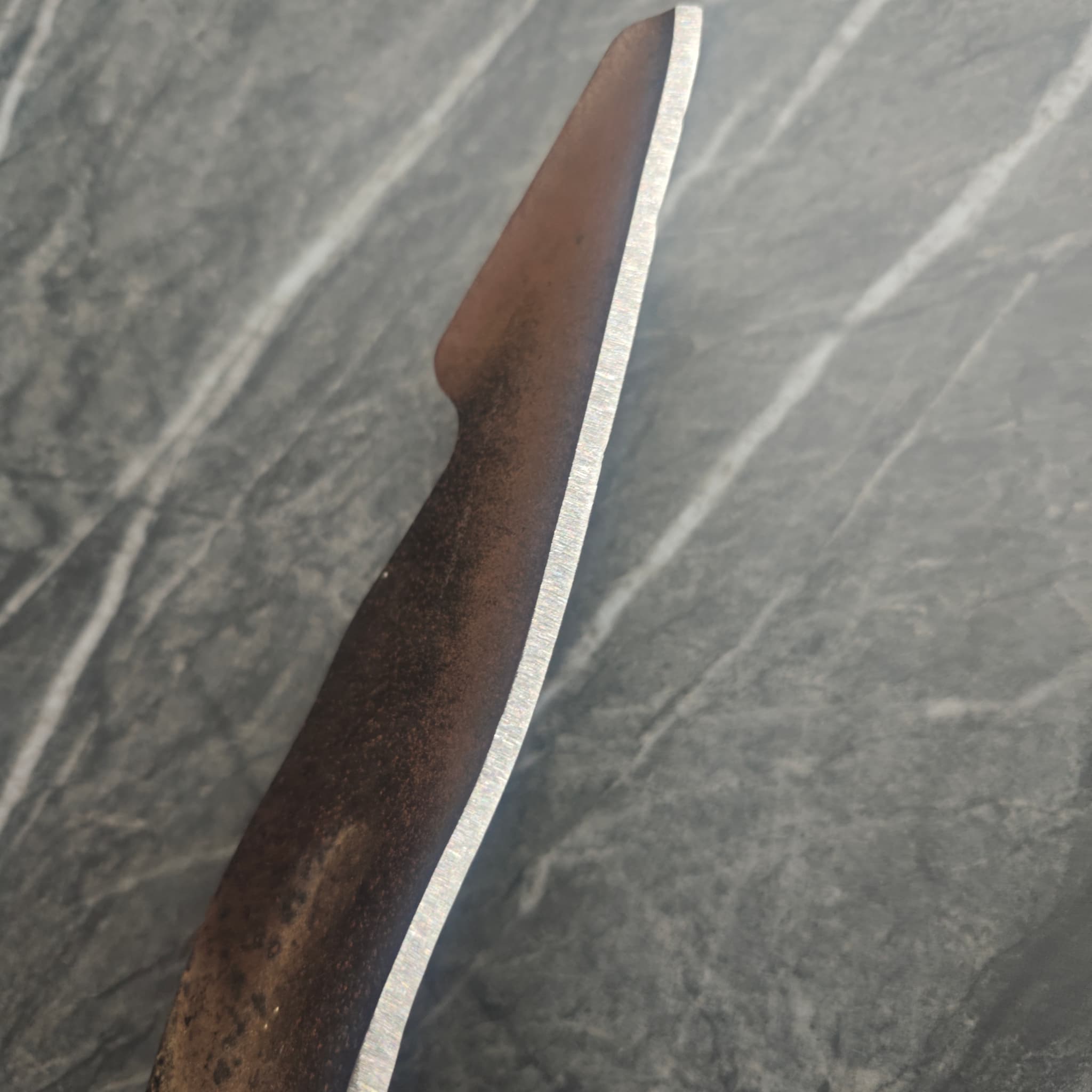 Same lawn mower blade with chip repaired and edge fully restored