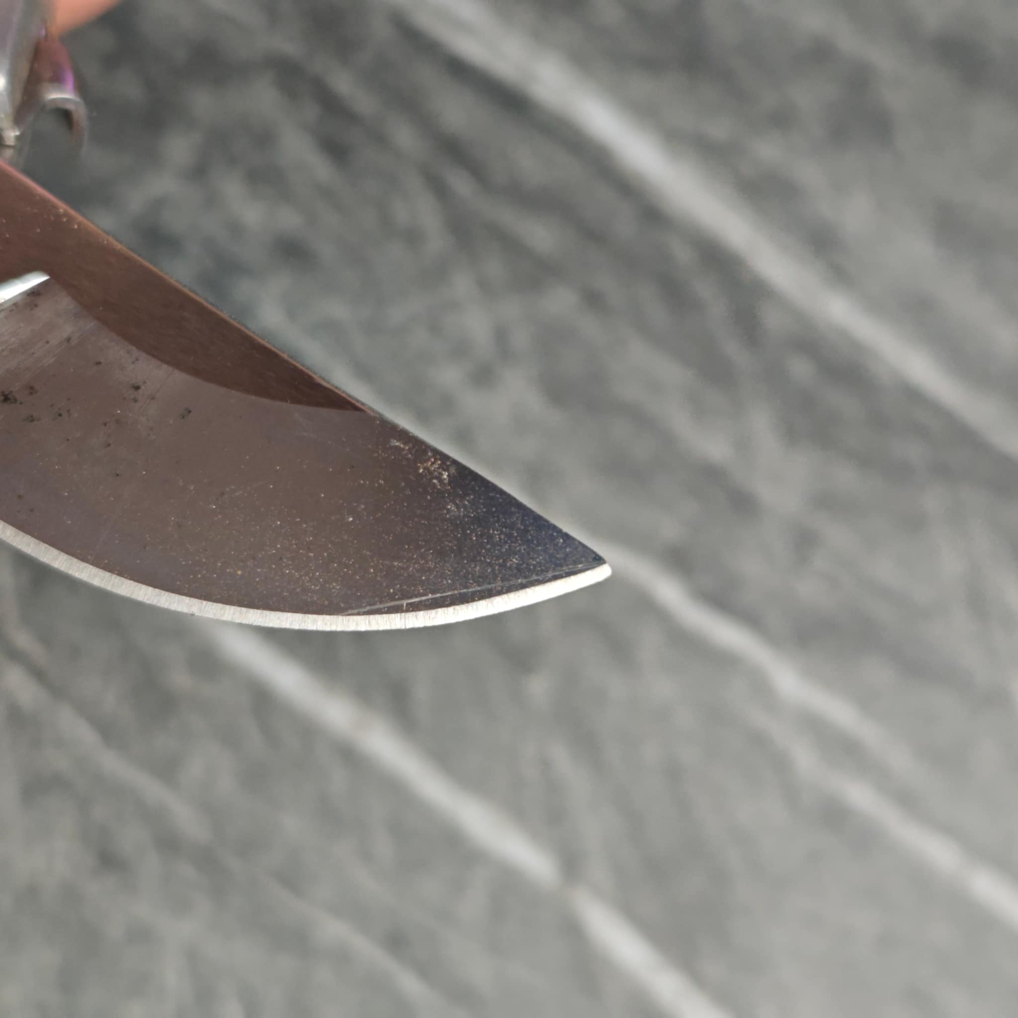 Sharpened knives arranged on work surface