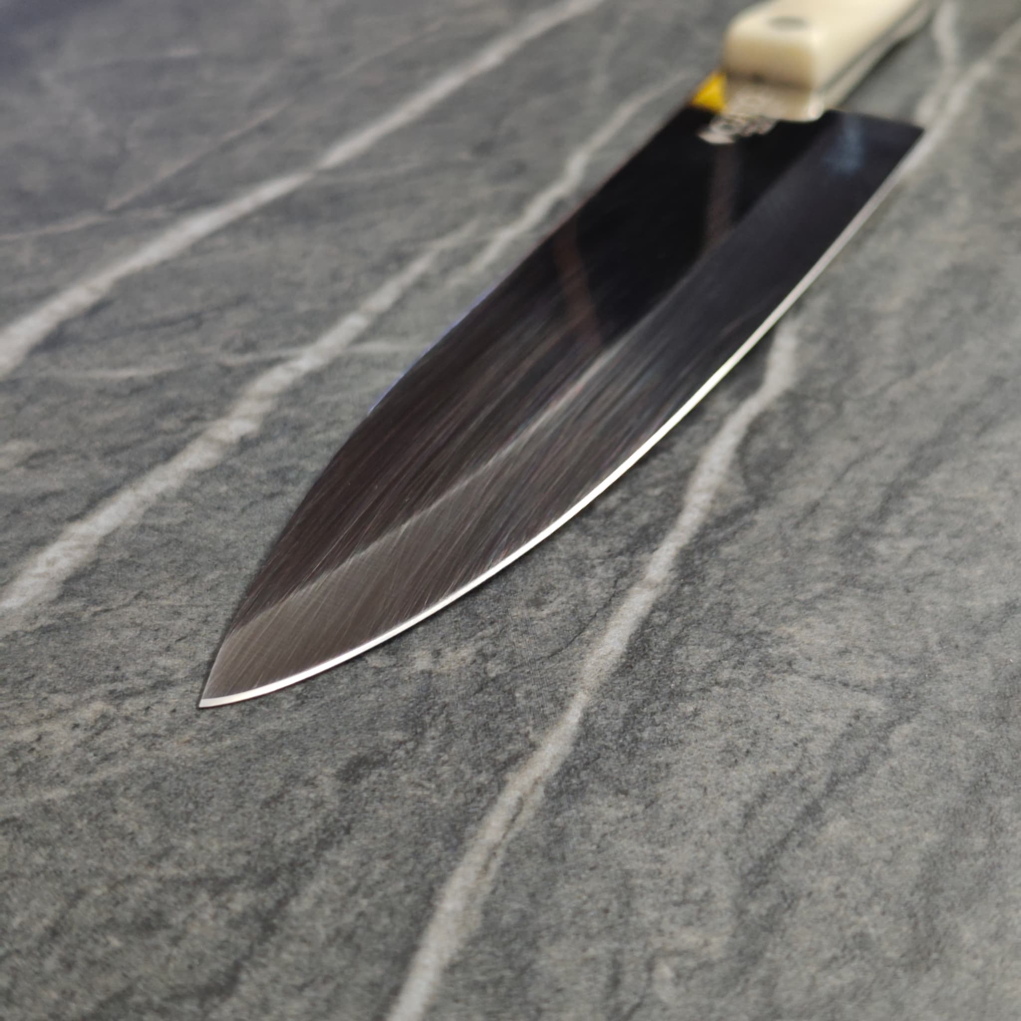 Cutco knife — razor-sharp edge after professional whetstone sharpening